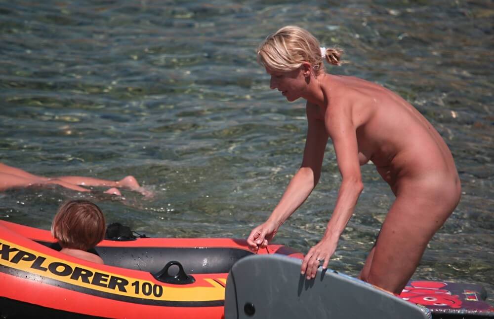 Red Boating for Two Nudists pics - Naturism and nudism