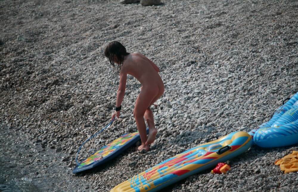 Naturist Surf Board Glides pics - Naturism and nudism
