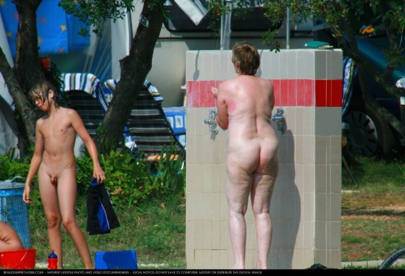 Covered in Towel Nudists-Boardwalk Biking - Naturism and nudism