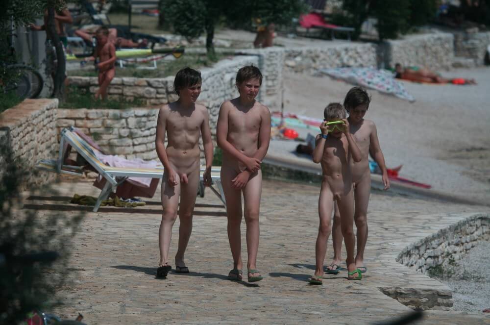 Shore walking nude - Naturism and nudism