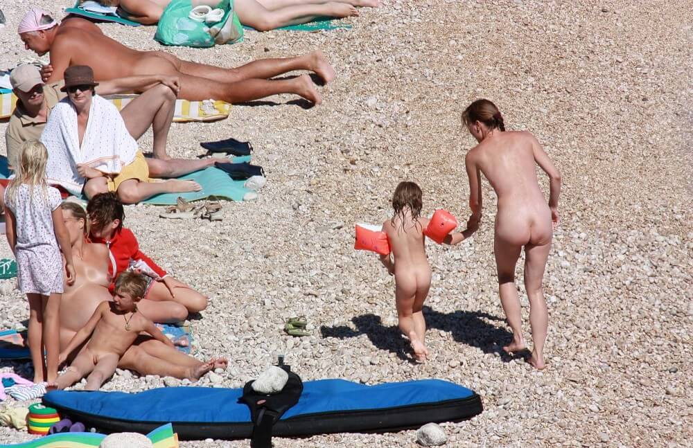 Orange Floaty Safety First Naturist pics - Naturism and nudism