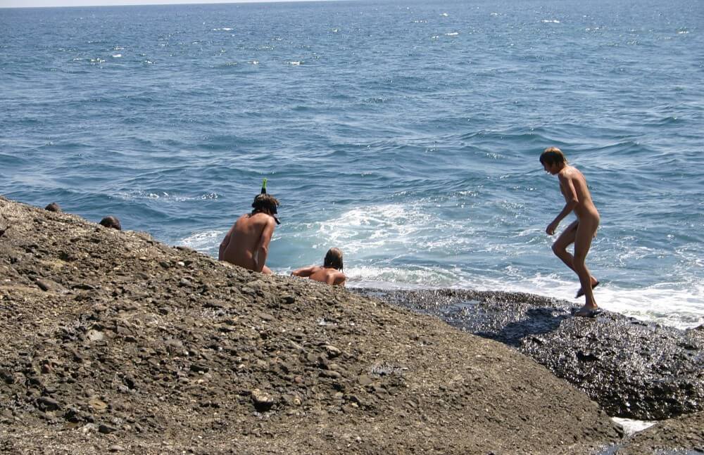 Leaning Against Hit Rocks pics - Naturism and nudism
